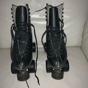 Vintage Riedell Leather Roller Skates with minor cosmetic issues pictured. Sz. 7